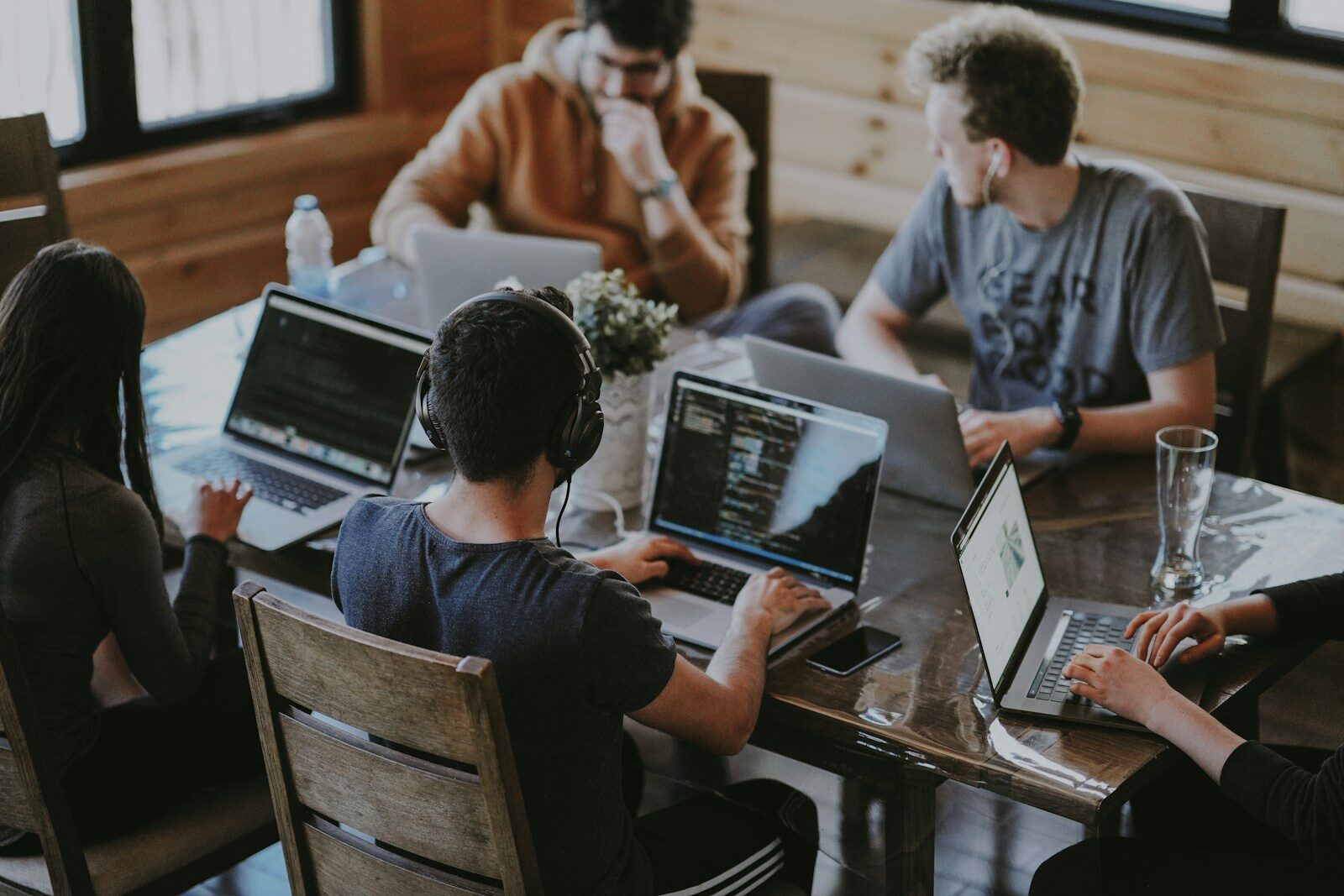 RH group of people using laptop computer